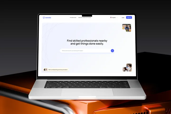 The Sewalo home page on a laptop against a dark and orange backdrop — “Find skilled professionals nearby and get things done easily” above a single search field.